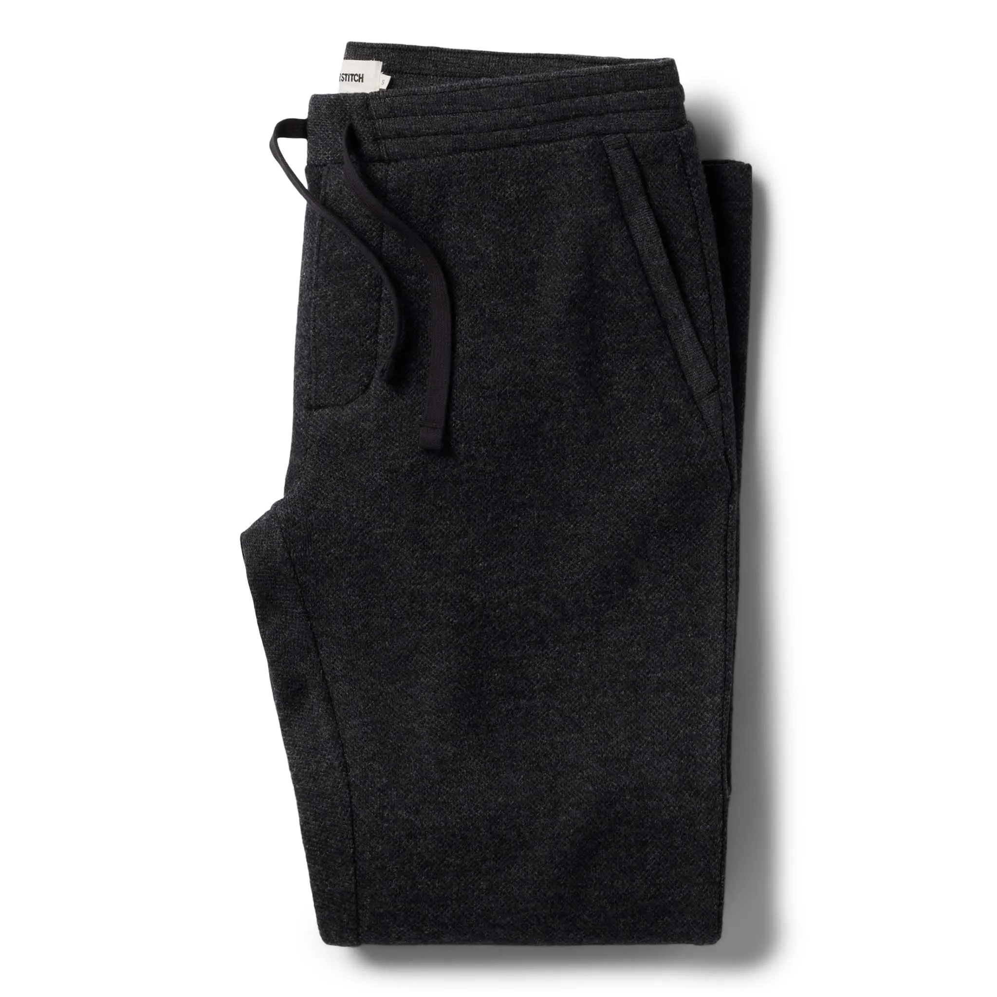The Weekend Pant in Charcoal Herringbone Wool sold by Taylor Stitch
