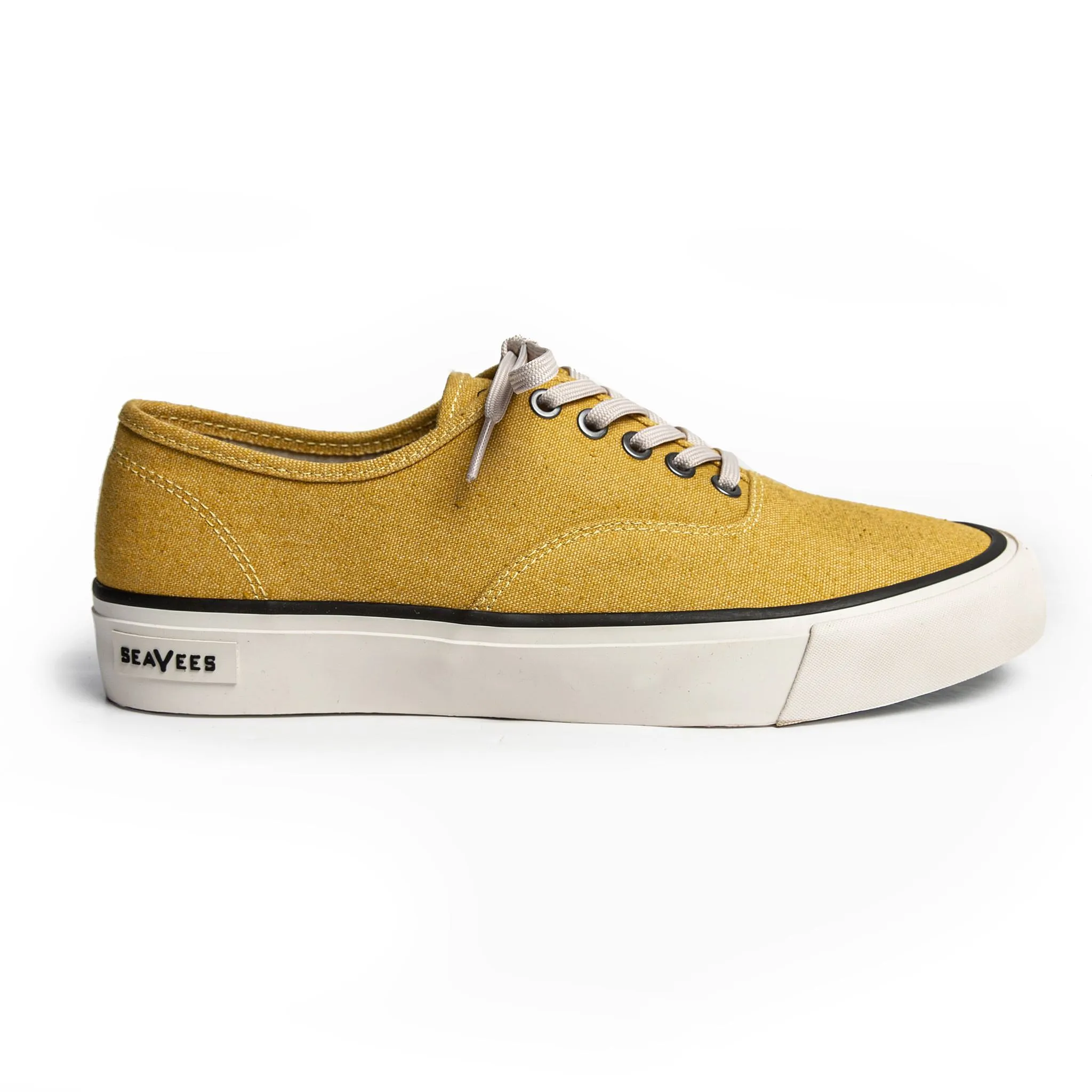 The Vista Sneaker in Gold Boss Duck sold by Taylor Stitch