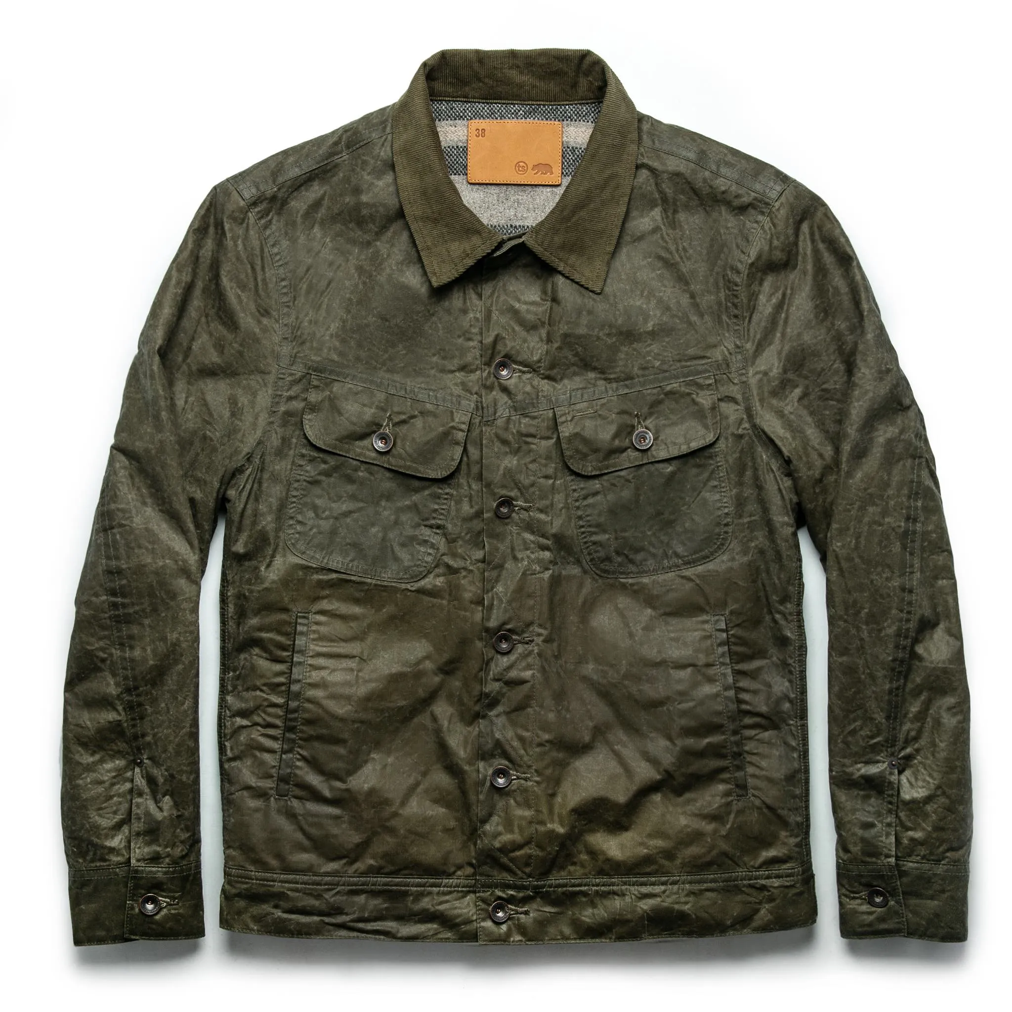 The Lined Long Haul Jacket in Olive Waxed Canvas sold by Taylor Stitch