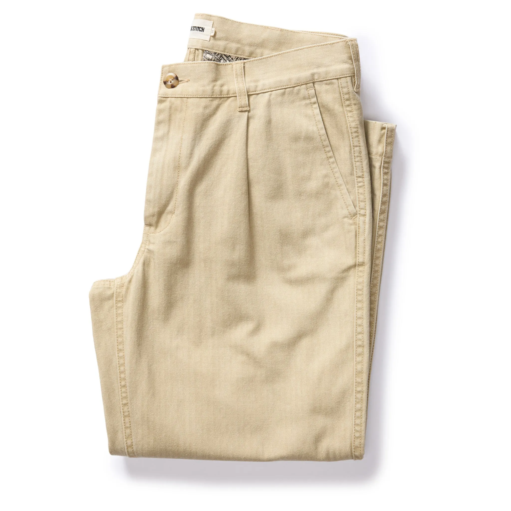 The Matlow Pant in Light Khaki Pigment Herringbone sold by Taylor Stitch