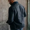 The Long Haul Jacket in Coal Waxed Canvas sold by Taylor Stitch