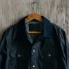 The Long Haul Jacket in Coal Waxed Canvas sold by Taylor Stitch
