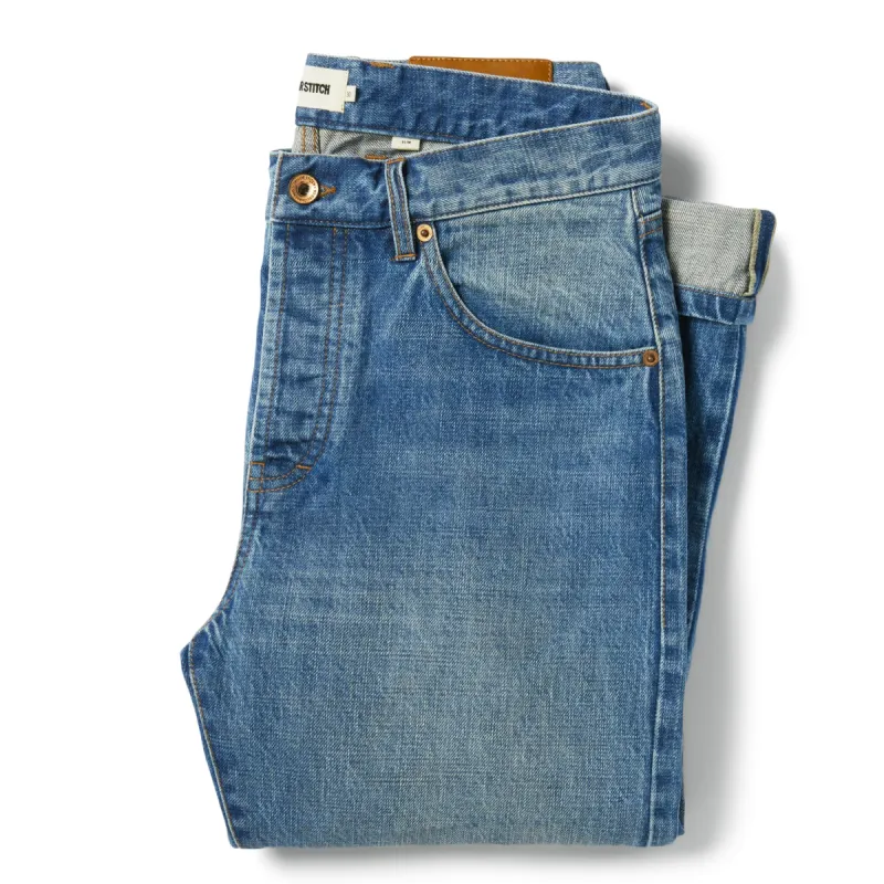 The Slim Jean in Patch Wash Selvage sold by Taylor Stitch
