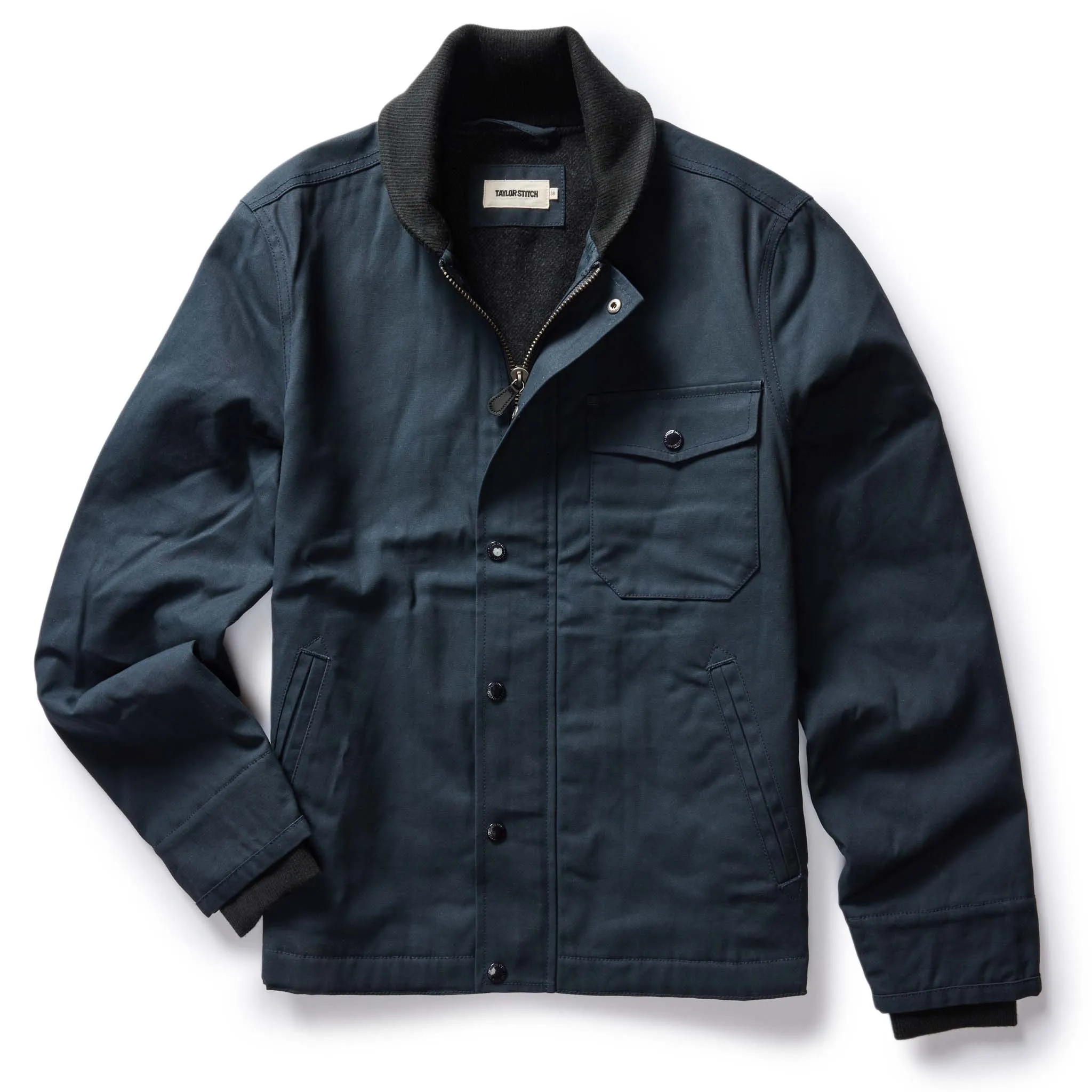 The Deck Jacket in Dark Navy Dry Wax sold by Taylor Stitch