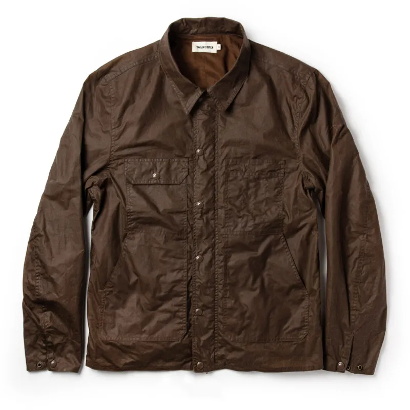 The Longshore Jacket in Dark Oak Waxed Canvas sold by Taylor Stitch