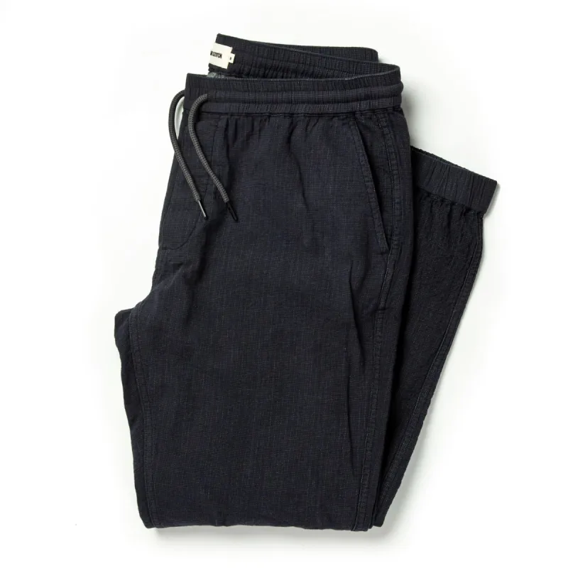 The Apres Pant in Coal Double Cloth sold by Taylor Stitch
