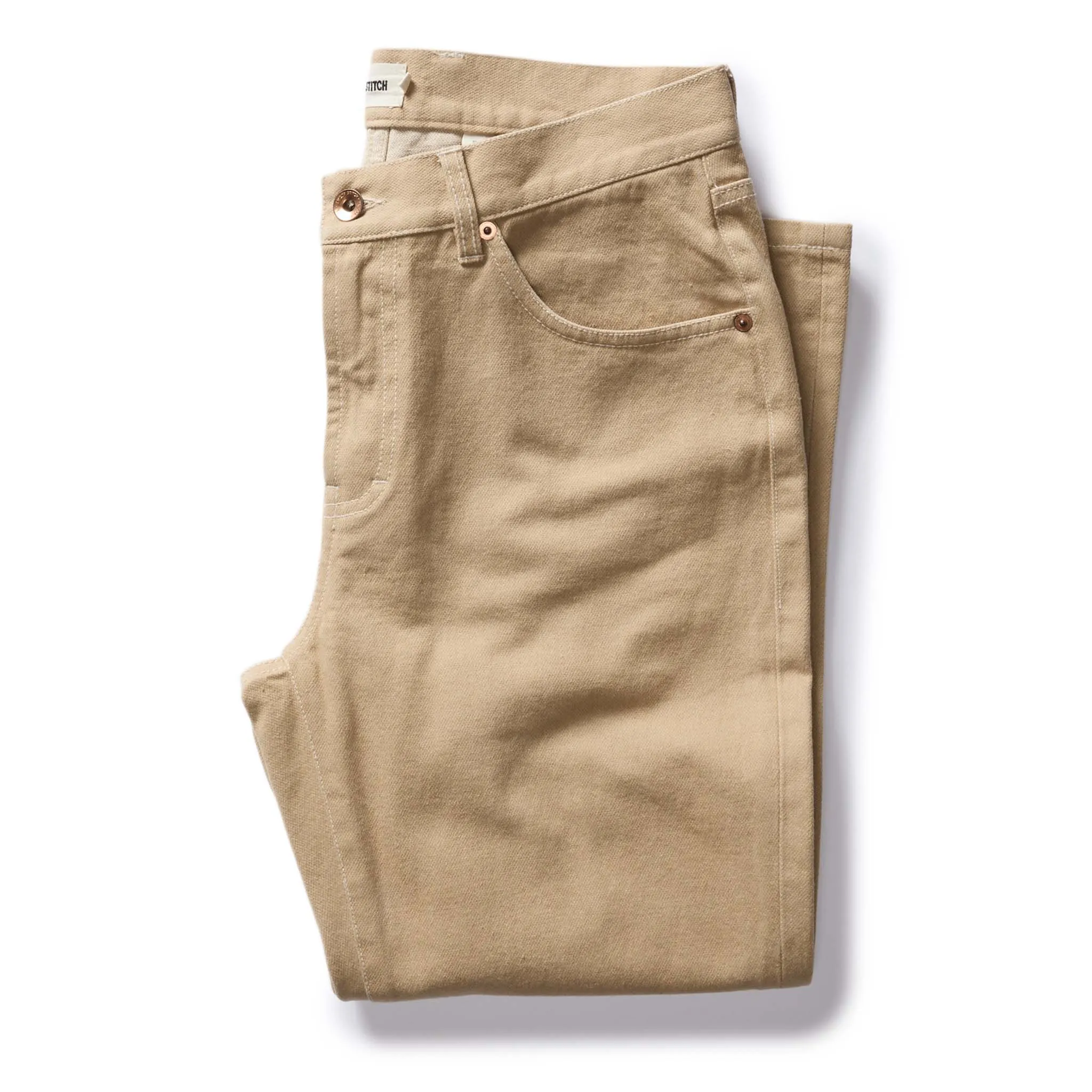 The Slim All Day Pant in Light Khaki Broken Twill sold by Taylor Stitch