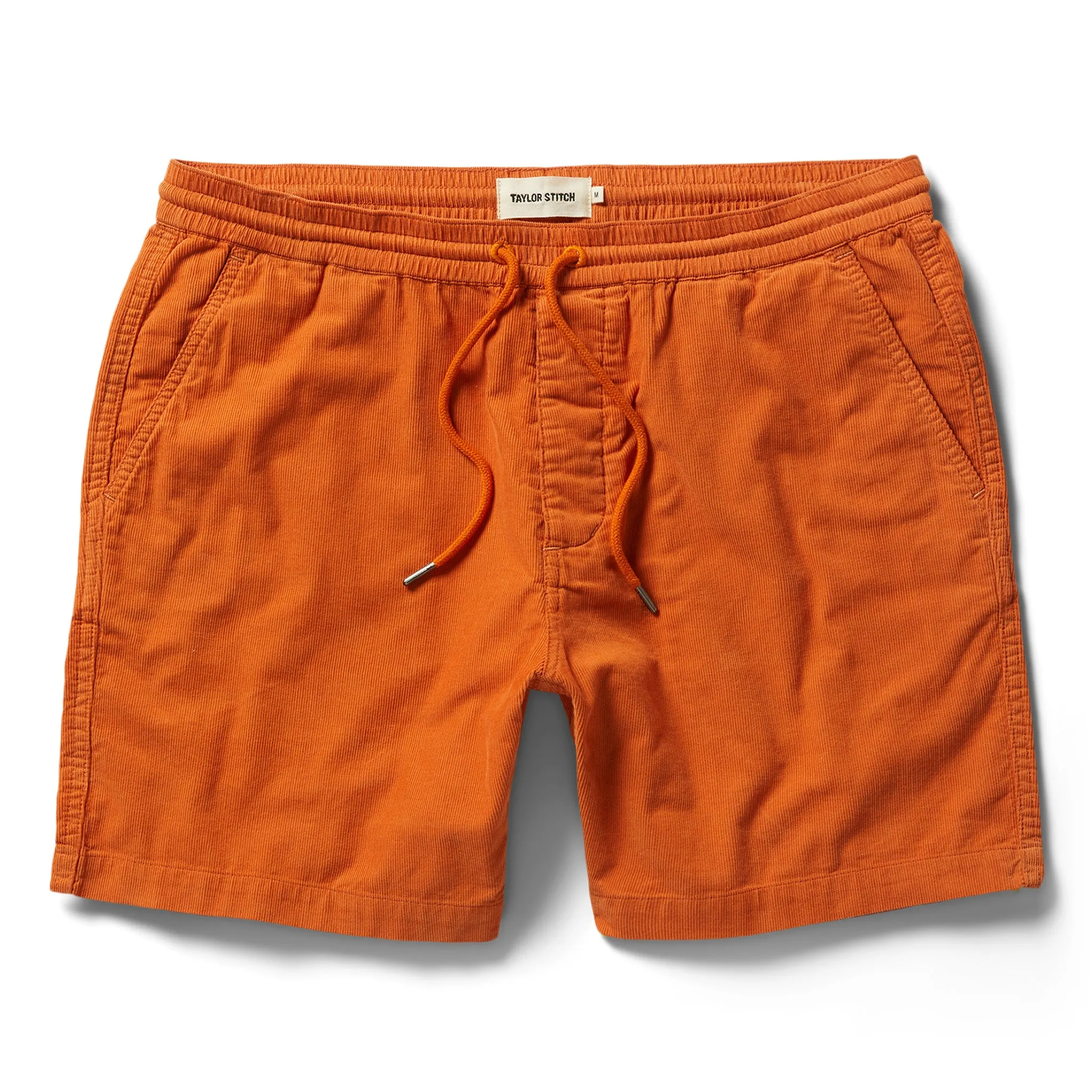 The Apres Short in Rust Pinwale sold by Taylor Stitch