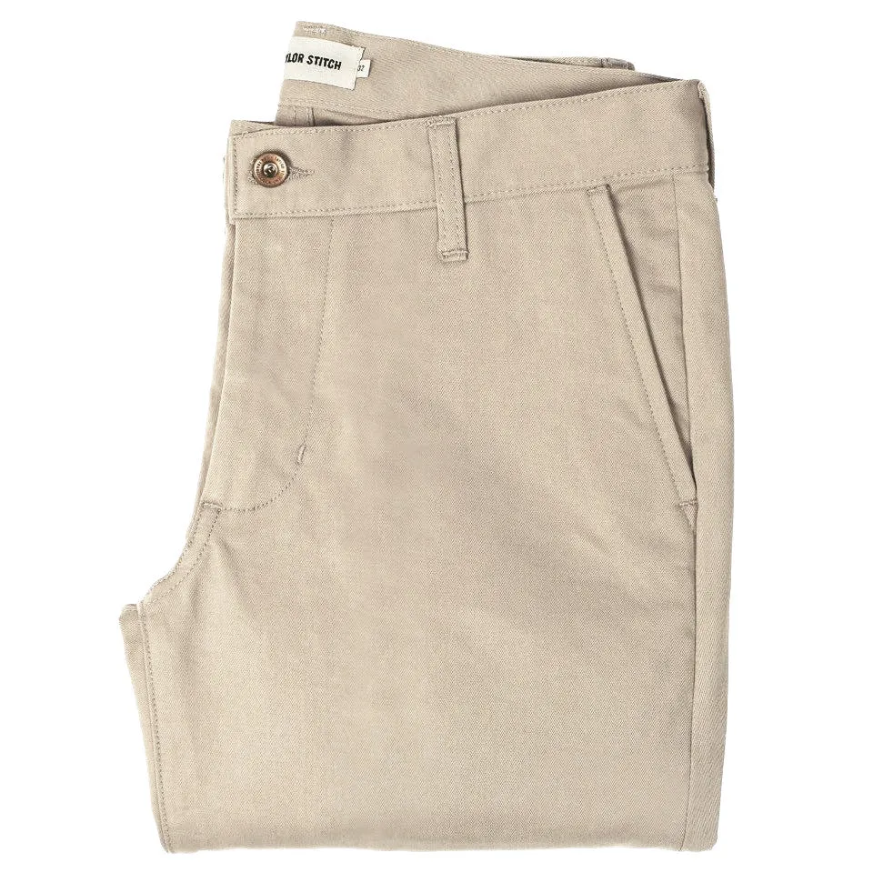The Slim Chino in Light Stone sold by Taylor Stitch