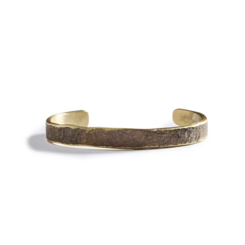 The Hammered Cuff in Brass sold by Taylor Stitch
