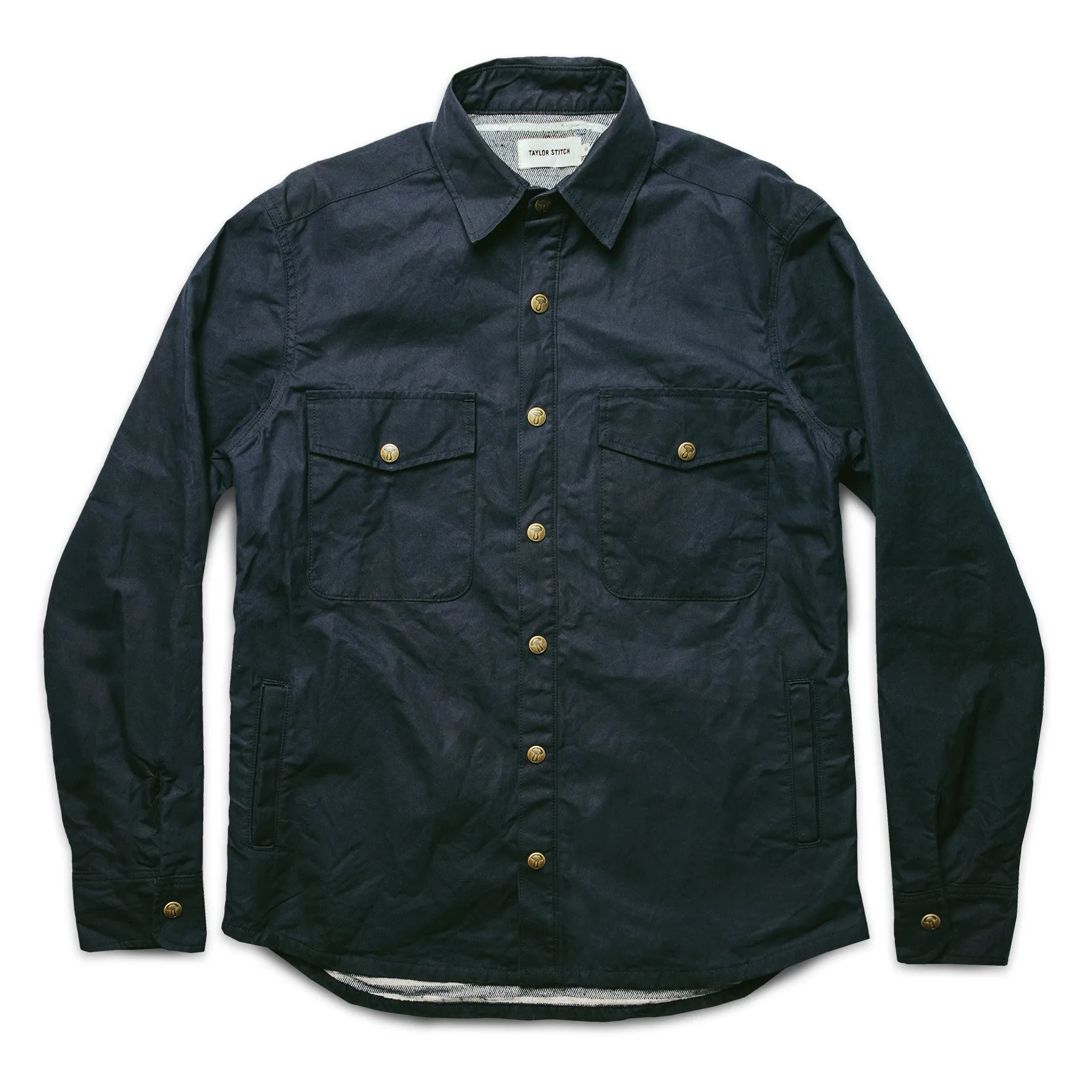 The Chore Jacket in Navy Dry Wax Canvas sold by Taylor Stitch