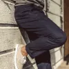 The Slim Chino in Organic Navy sold by Taylor Stitch