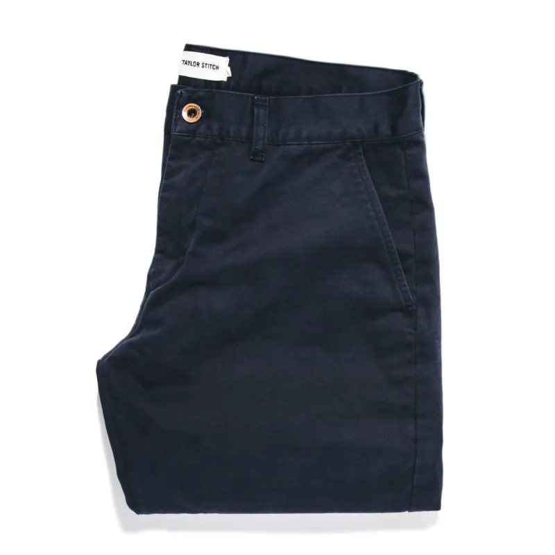 The Slim Chino in Organic Navy sold by Taylor Stitch