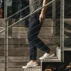 The Slim Chino in Organic Navy sold by Taylor Stitch