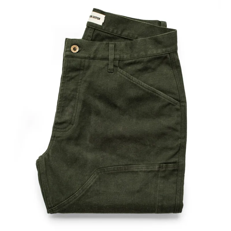 The Chore Pant in Dark Olive Boss Duck sold by Taylor Stitch