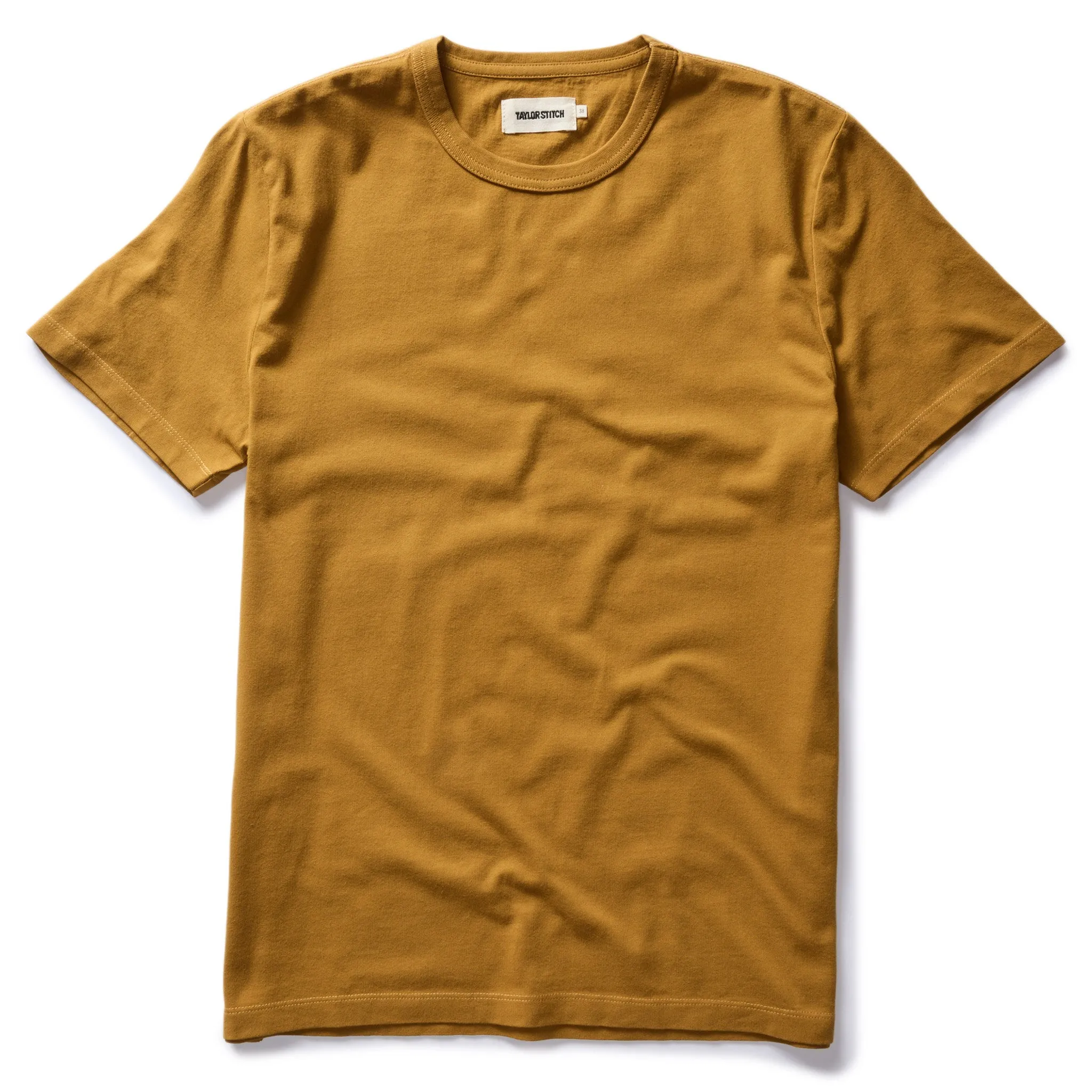 The Organic Cotton Tee in Old Gold sold by Taylor Stitch