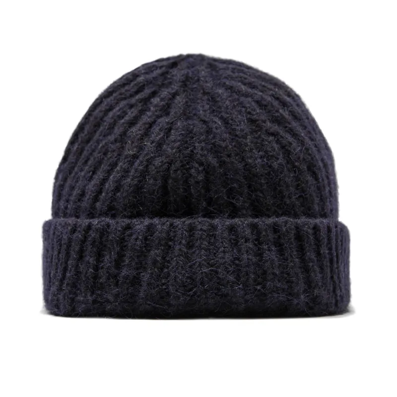 The Beanie in Navy Alpaca sold by Taylor Stitch