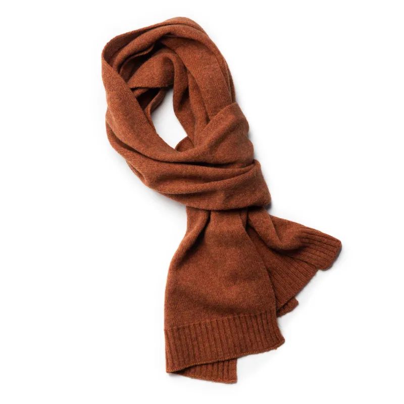 The Lodge Scarf in Rust sold by Taylor Stitch