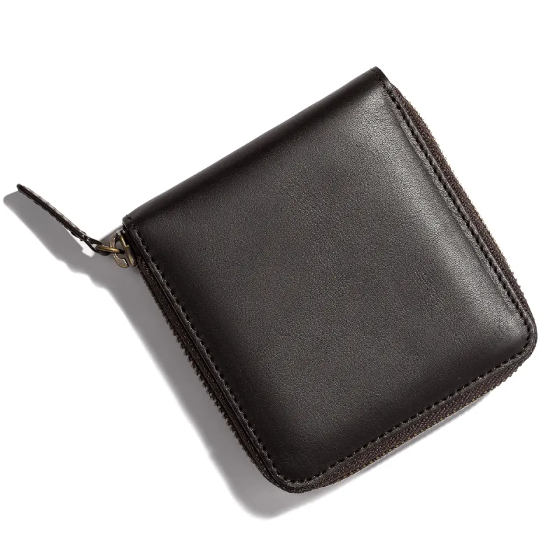 The Zip Wallet in Brown sold by Taylor Stitch
