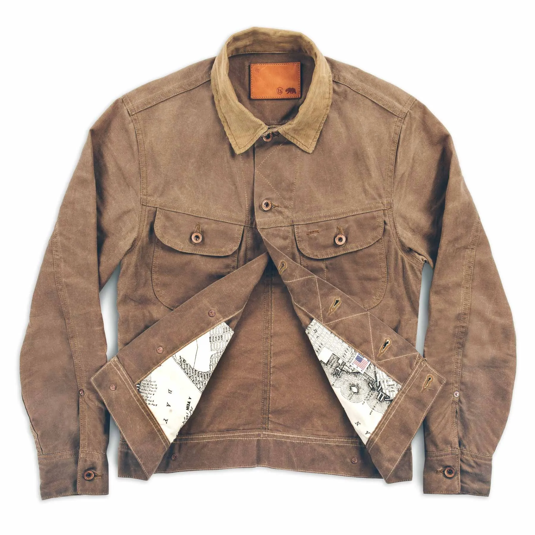 The Long Haul Jacket in Field Tan Waxed Canvas sold by Taylor Stitch