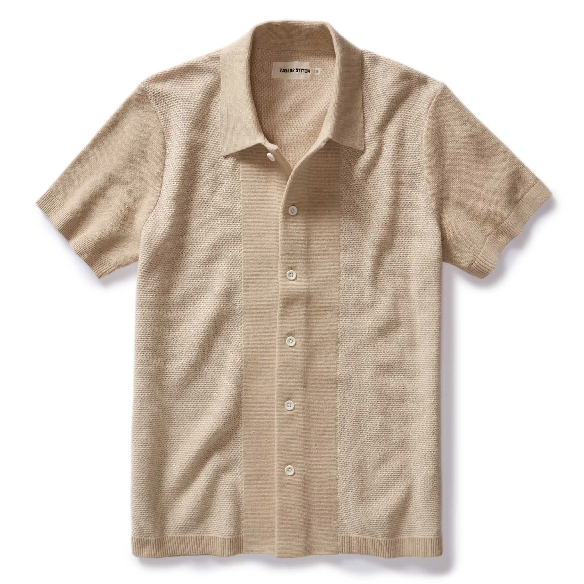 The Button Down Polo in Faded Khaki Seed Stitch sold by Taylor Stitch