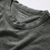 The Merino Tee in Heather Army sold by Taylor Stitch