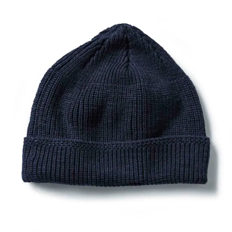 The Rib Beanie in Heather Navy sold by Taylor Stitch