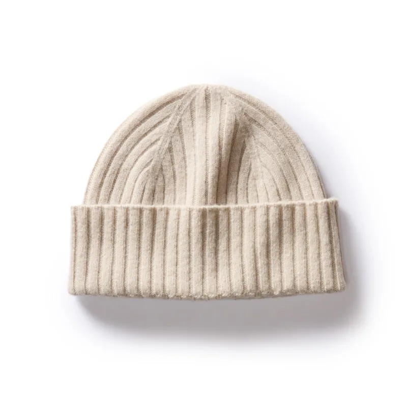The Rib Beanie in Oat Heather sold by Taylor Stitch