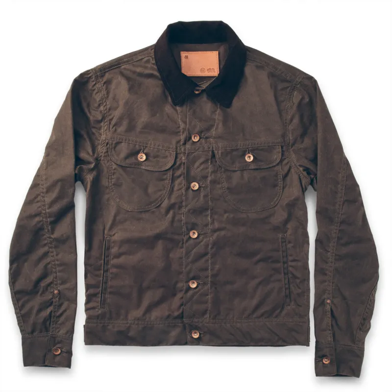 The Long Haul Jacket in Dark Oak Waxed Canvas sold by Taylor Stitch