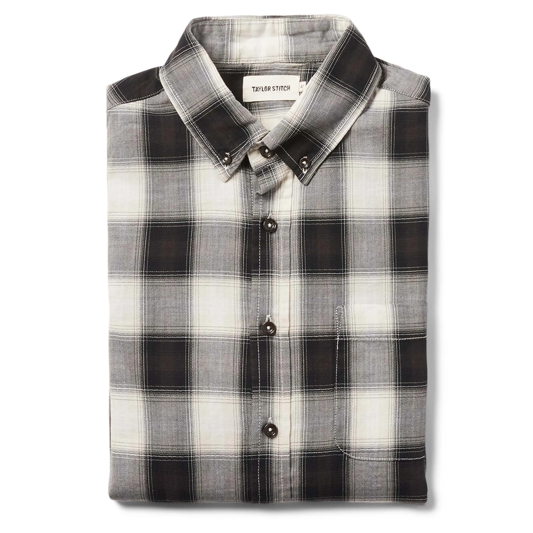 The Jack in Coal Herringbone Check sold by Taylor Stitch