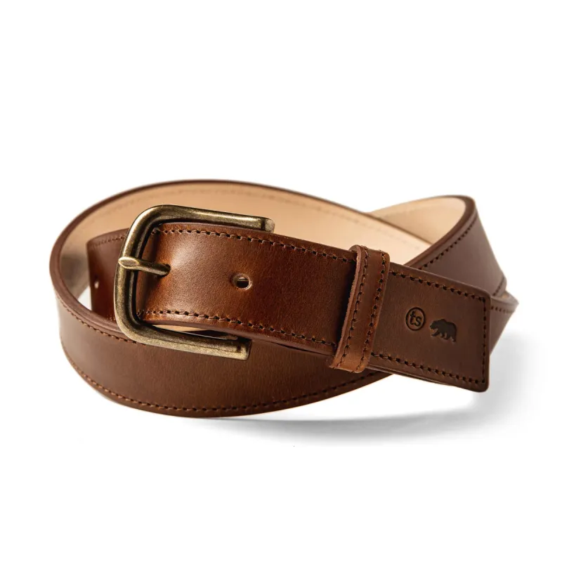 The Stitched Belt in Whiskey Eagle sold by Taylor Stitch