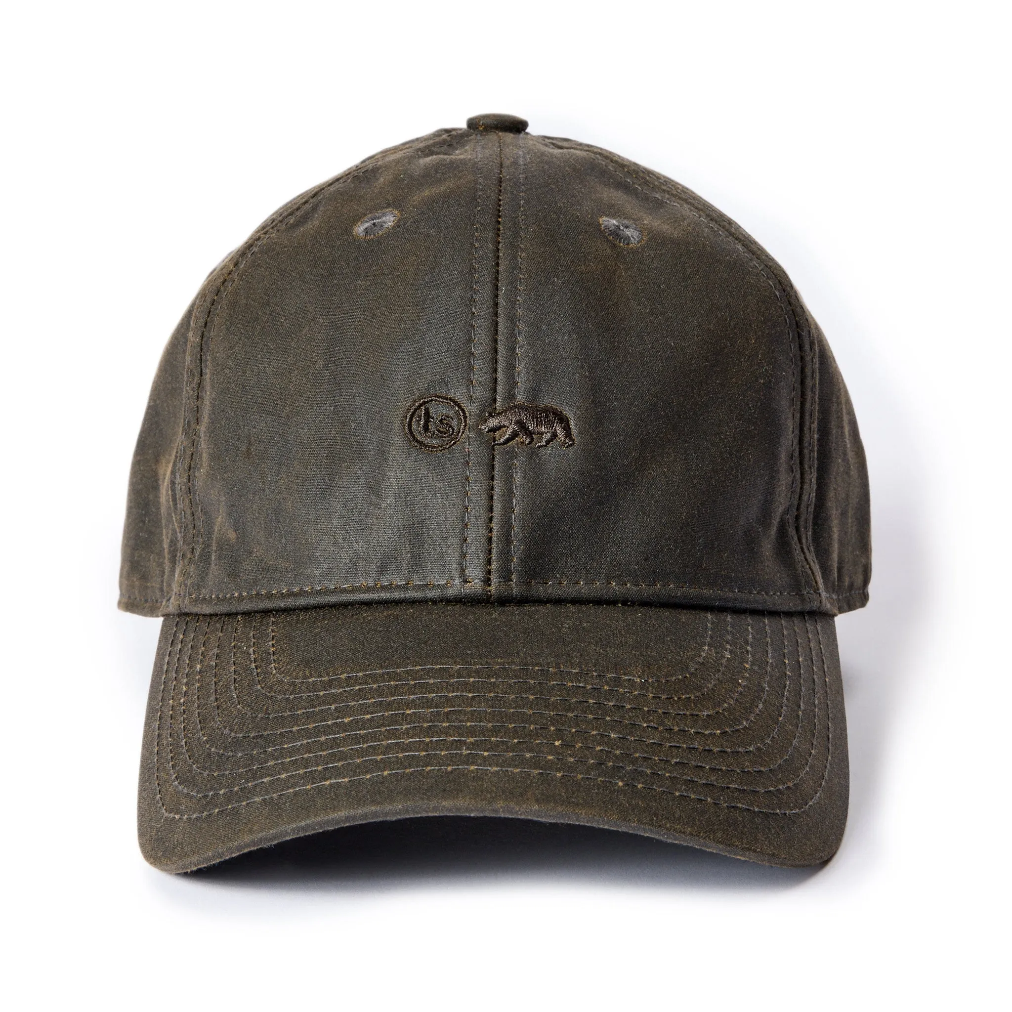 The Ball Cap in Soil Waxed Canvas sold by Taylor Stitch
