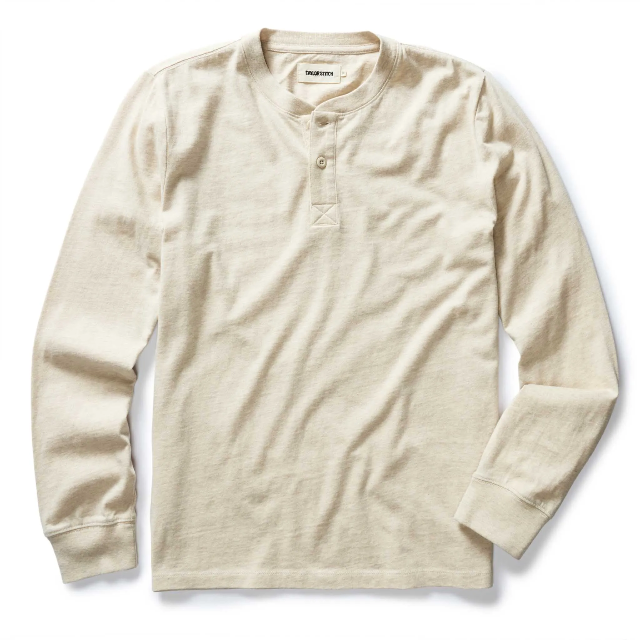 The Organic Cotton Henley in Heather Oat sold by Taylor Stitch