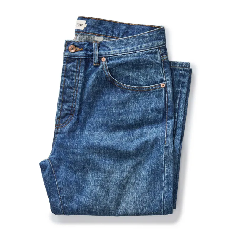 The Slim Jean in Mid Wash Organic Selvedge sold by Taylor Stitch