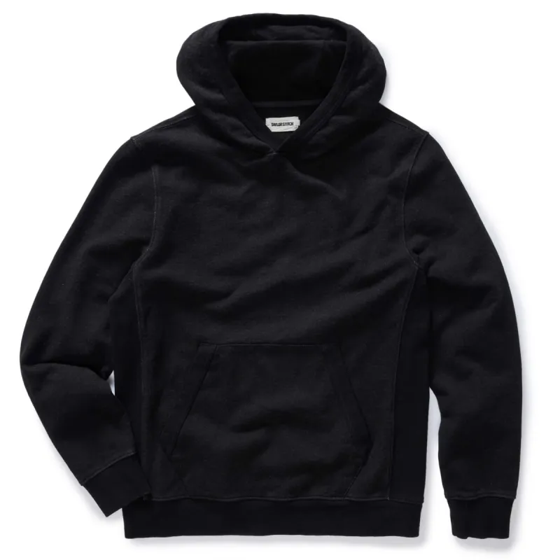The Apres Hoodie in Black Indigo Terry sold by Taylor Stitch