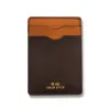 The Minimalist Wallet in Brown sold by Taylor Stitch
