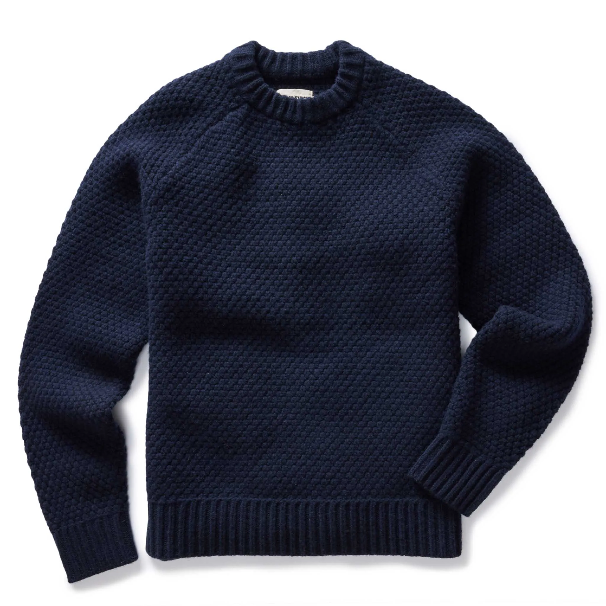 The Fisherman Sweater in Dark Navy Merino sold by Taylor Stitch
