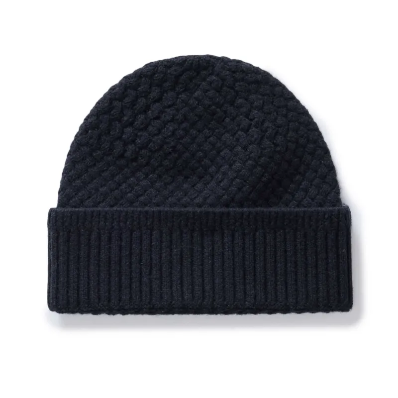 The Textured Knit Beanie in Heather Navy Merino sold by Taylor Stitch