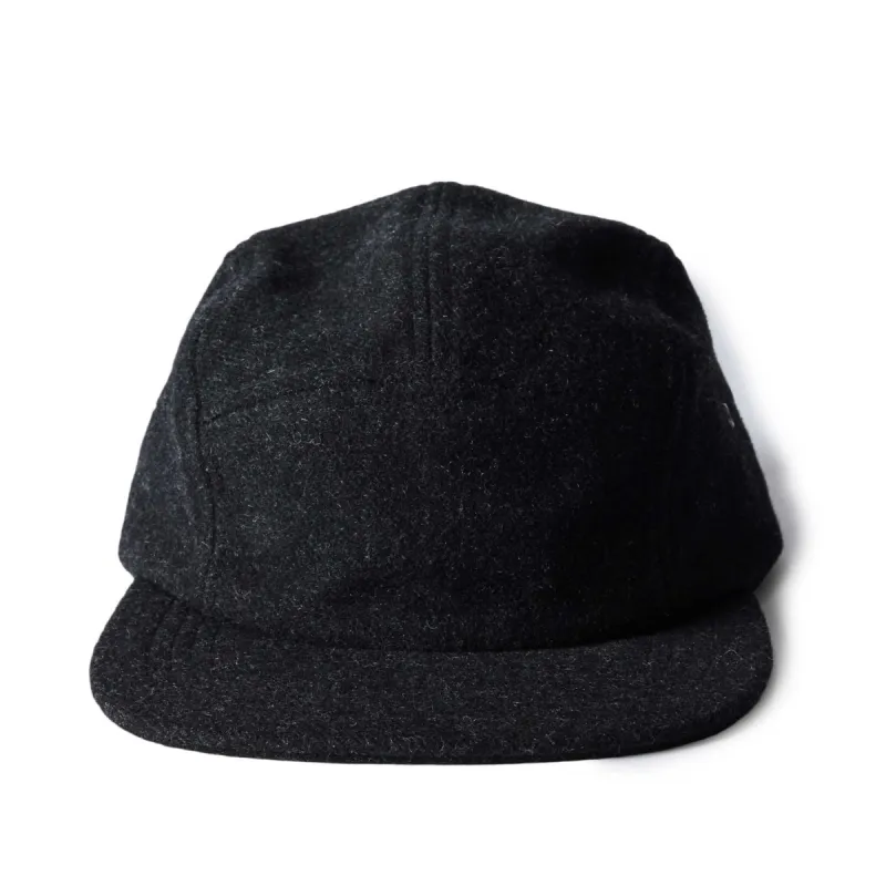 The 5-Panel Cap in Heather Coal Wool Blend sold by Taylor Stitch