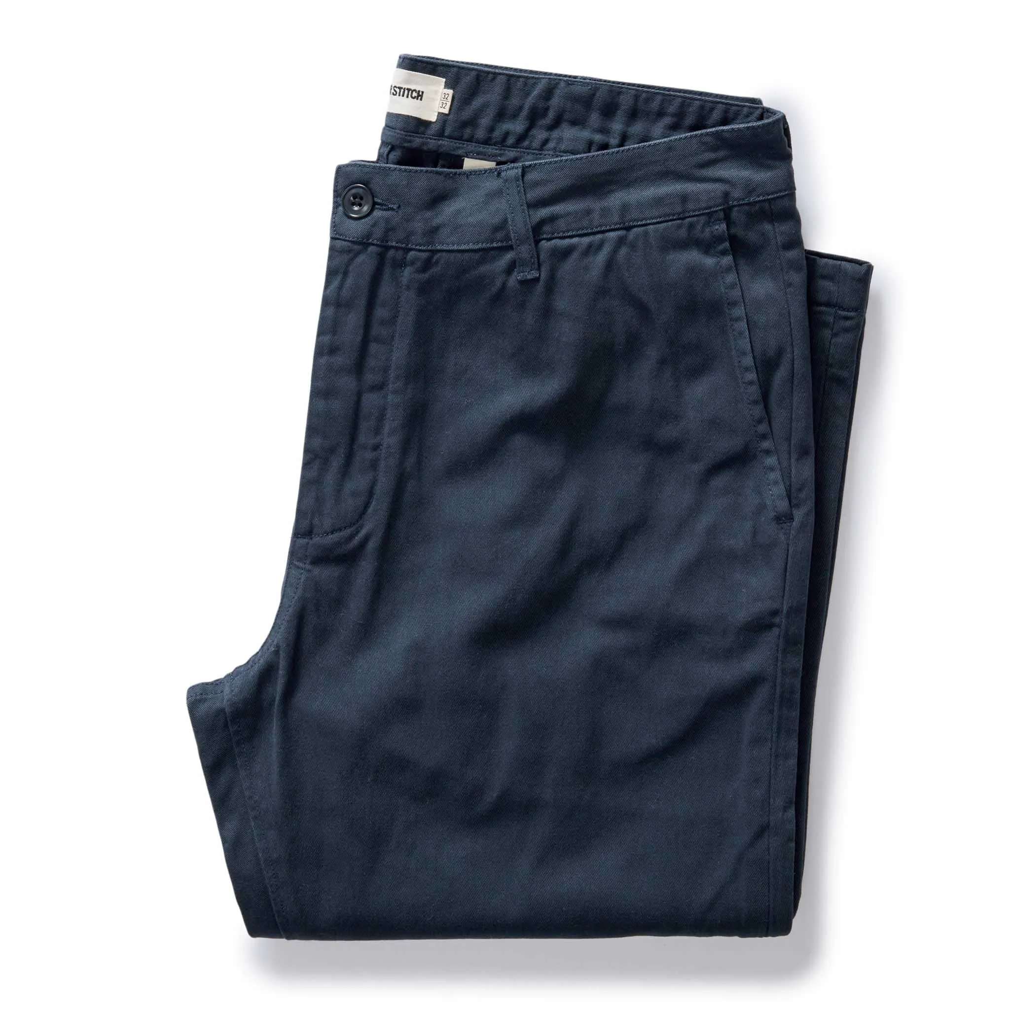 The Slim Foundation Pant in Organic Navy sold by Taylor Stitch
