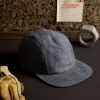 The 5-Panel Cap in Washed Indigo sold by Taylor Stitch