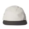 The 5-Panel Cap in Stone Pigment Canvas sold by Taylor Stitch