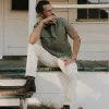 The Short Sleeve Surplus Shirt in Field Olive Reverse Sateen sold by Taylor Stitch