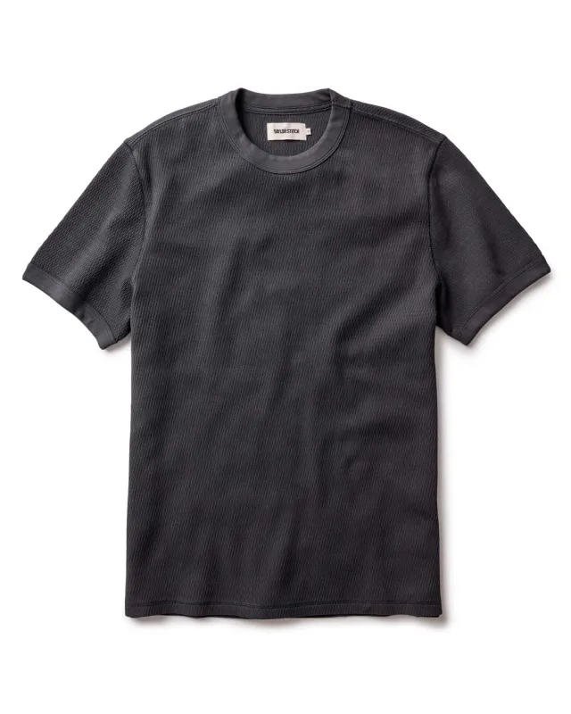 The Organic Cotton Short Sleeve Crew in Faded Black Waffle sold by Taylor Stitch