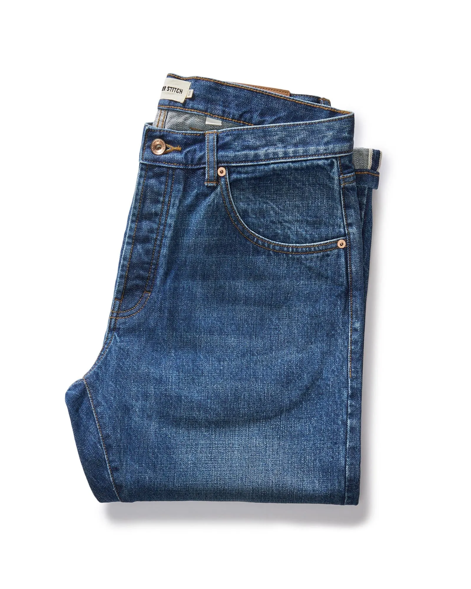 The Slim Jean in Mid Wash Organic Selvedge sold by Taylor Stitch