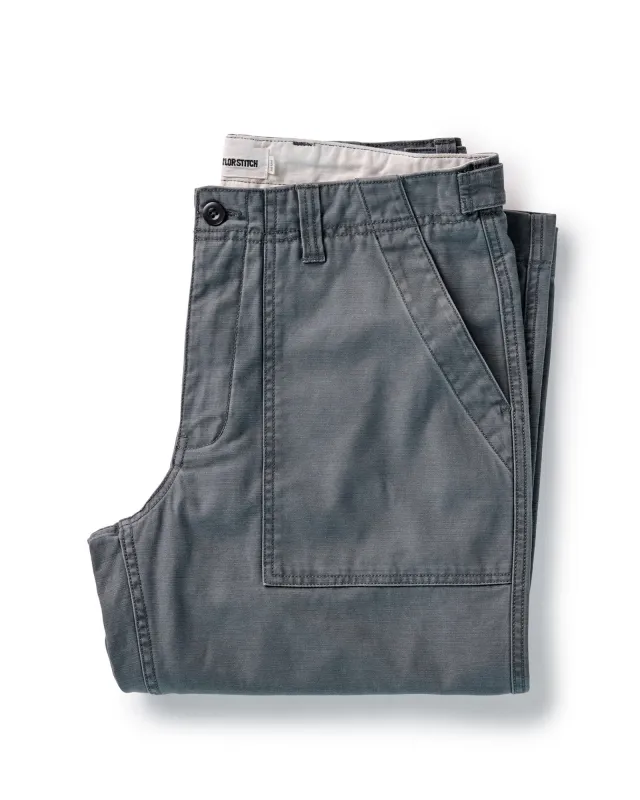 The Surplus Pant in Faded Black Reverse Sateen sold by Taylor Stitch