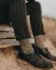 The Slim Jean in Washed Black Organic Slub Selvedge sold by Taylor Stitch