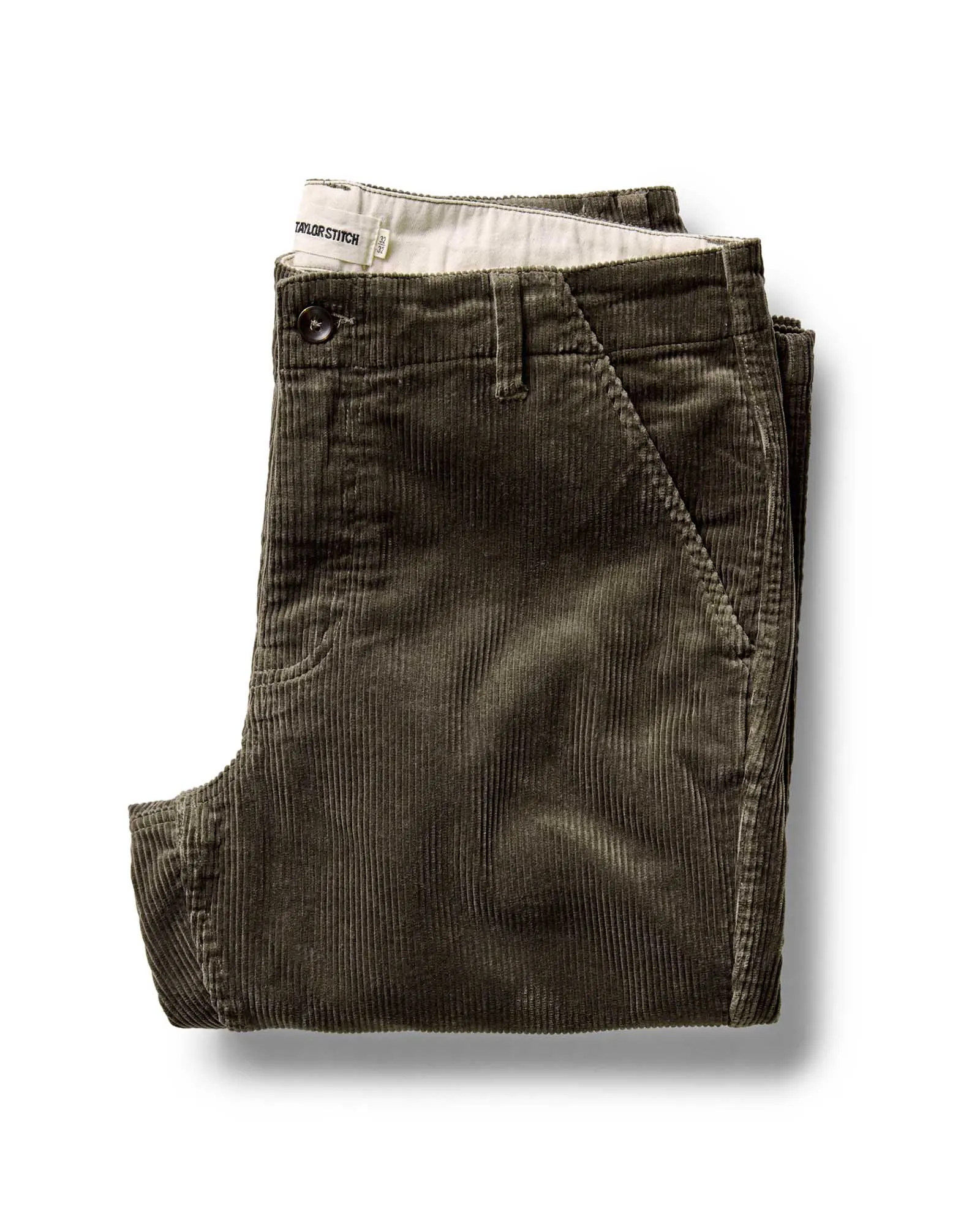 The Carnegie Pant in Fatigue Olive Corduroy sold by Taylor Stitch