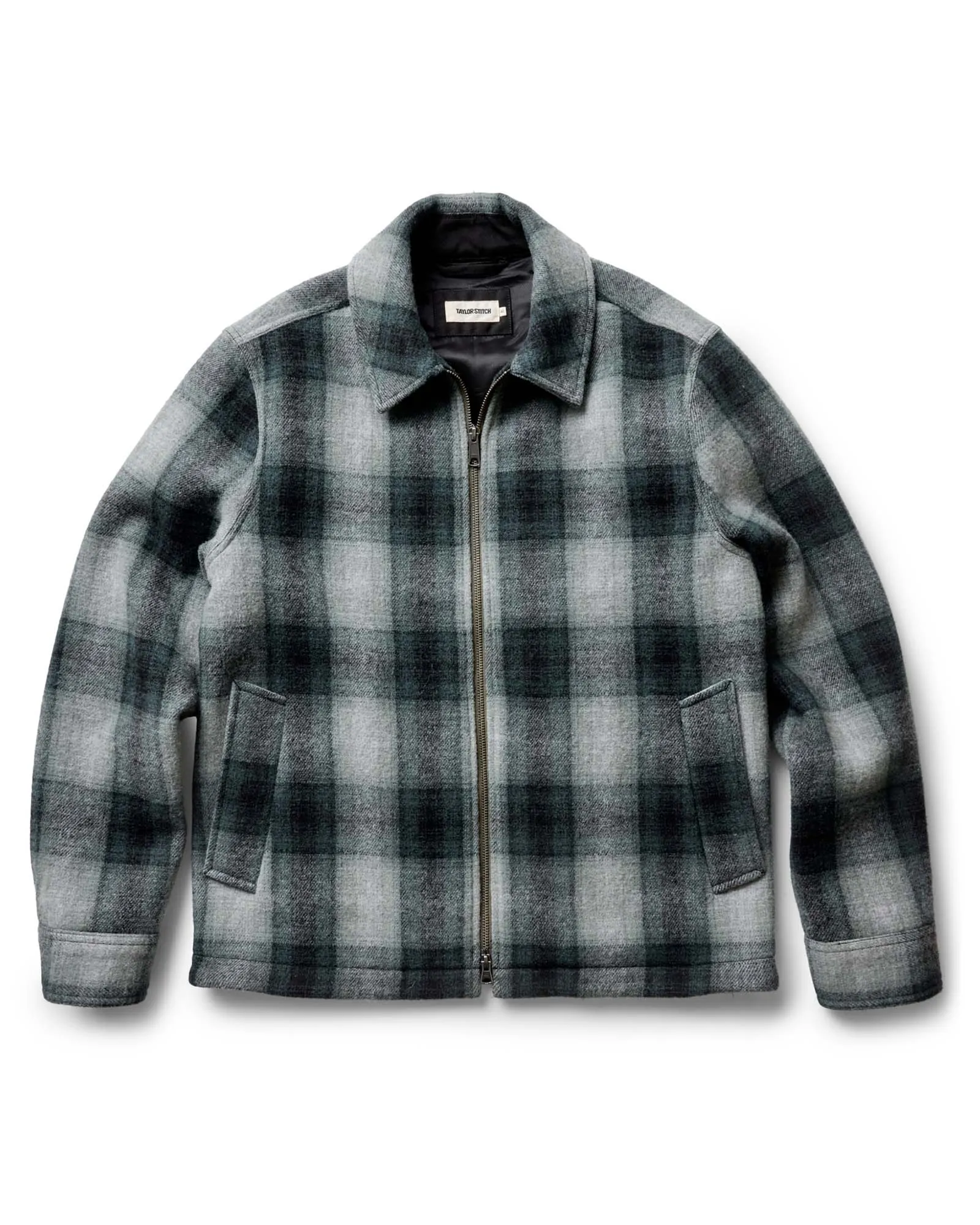 The Waterfront Jacket in Evergreen Plaid Wool sold by Taylor Stitch