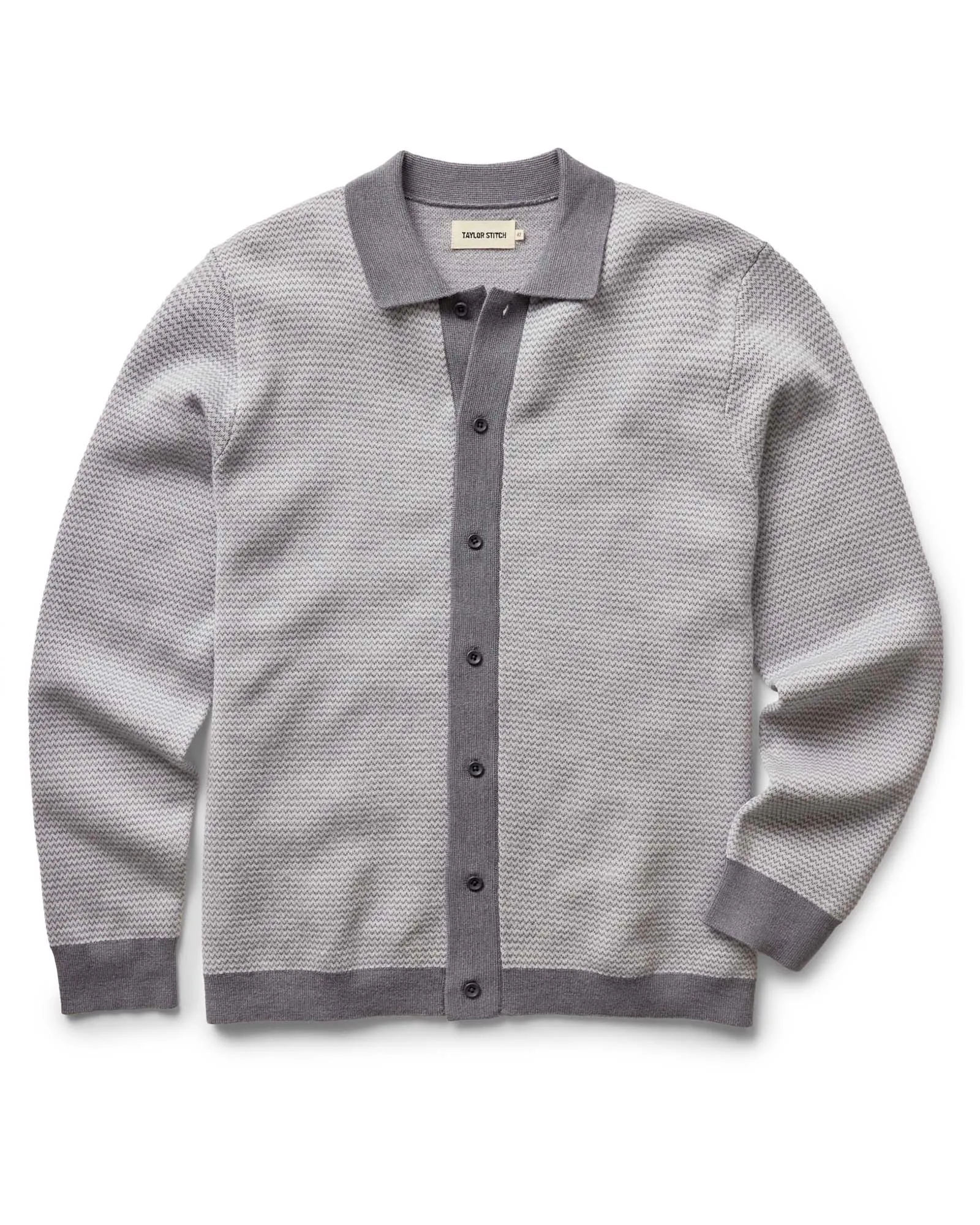 The Nichols Polo in Heather Grey Birdseye Merino sold by Taylor Stitch
